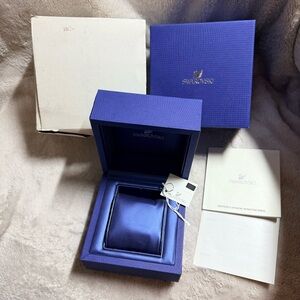 SWAROVSKI Blue Watch Box + Outer Boxes + Booklets + Tag
5.25 x 5.25 x 4 inches